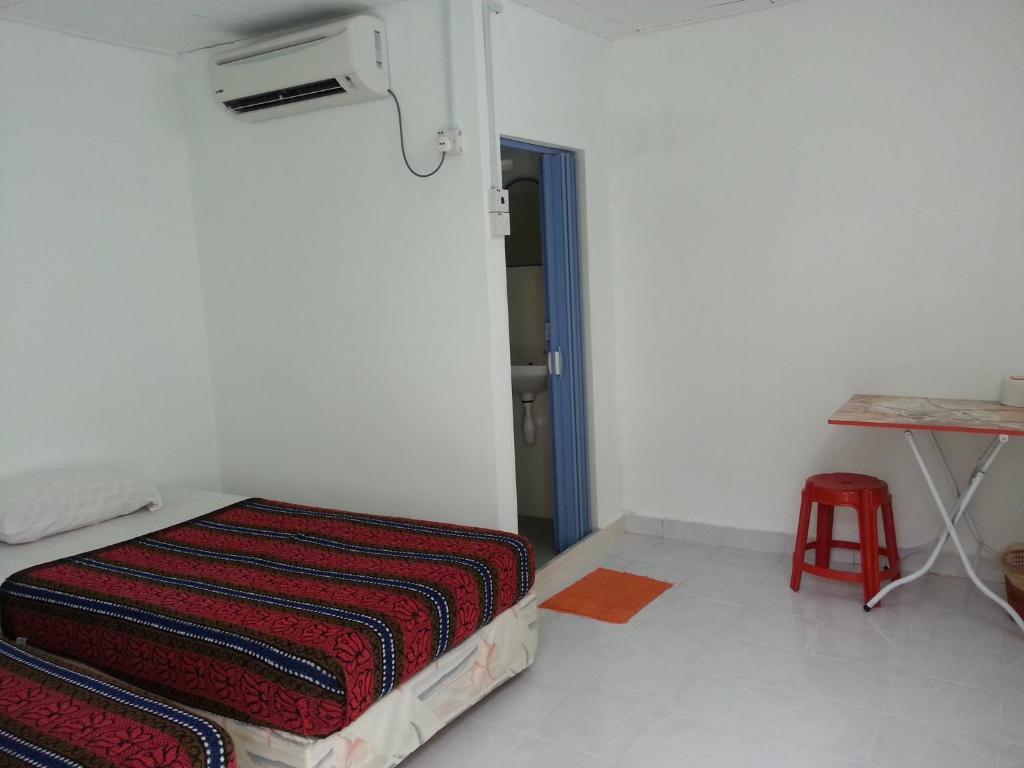 Et Budget Guest House Batu Feringgi Δωμάτιο φωτογραφία